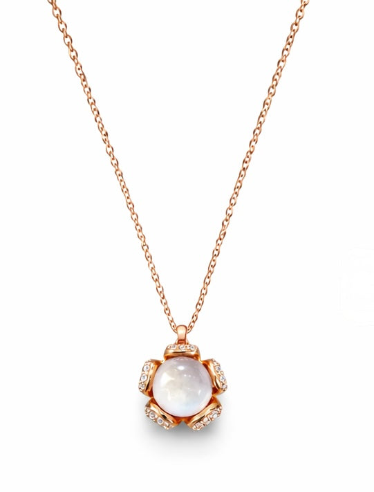 Colgante de oro rosa con piedra luna y diamantes