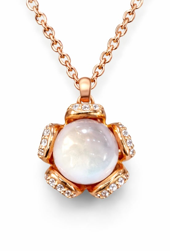 Colgante de oro rosa con piedra luna y diamantes