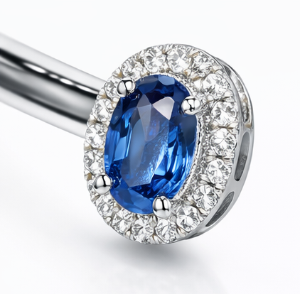 Pulsera abierta de oro blanco con zafiro azul y diamantes