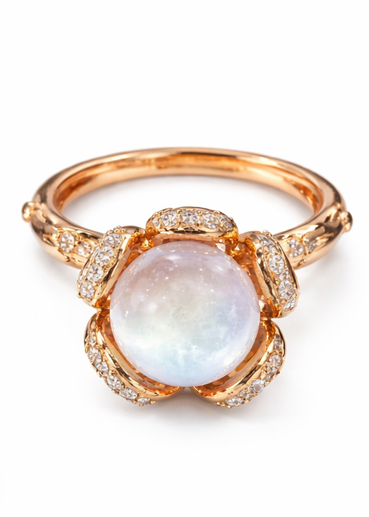 Anillo de oro rosa con piedra luna y diamantes