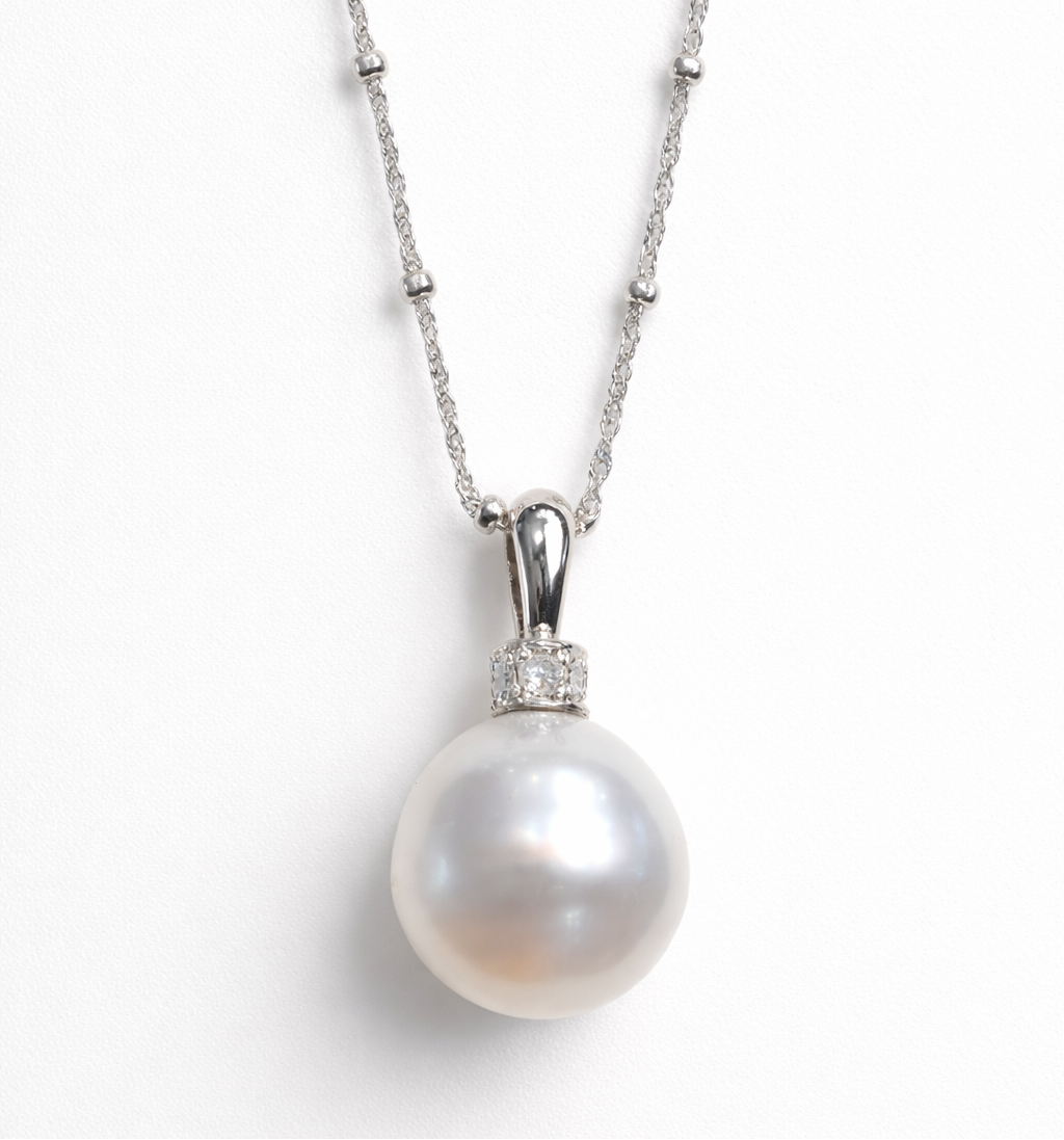 Colgante de Oro Blanco con Perla Australiana y Diamantes