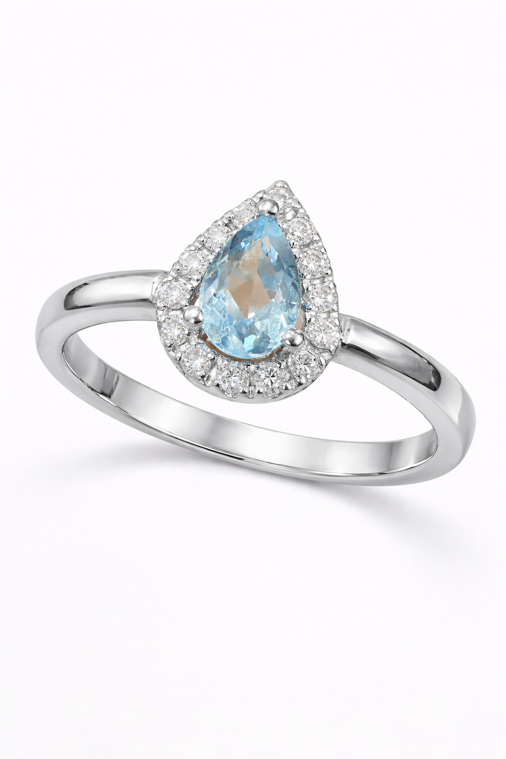 Anillo oro blanco con piedra central agua marina