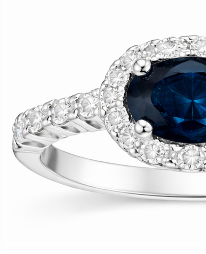 Anillo de Oro Blanco con Zafiro Azul y Diamantes