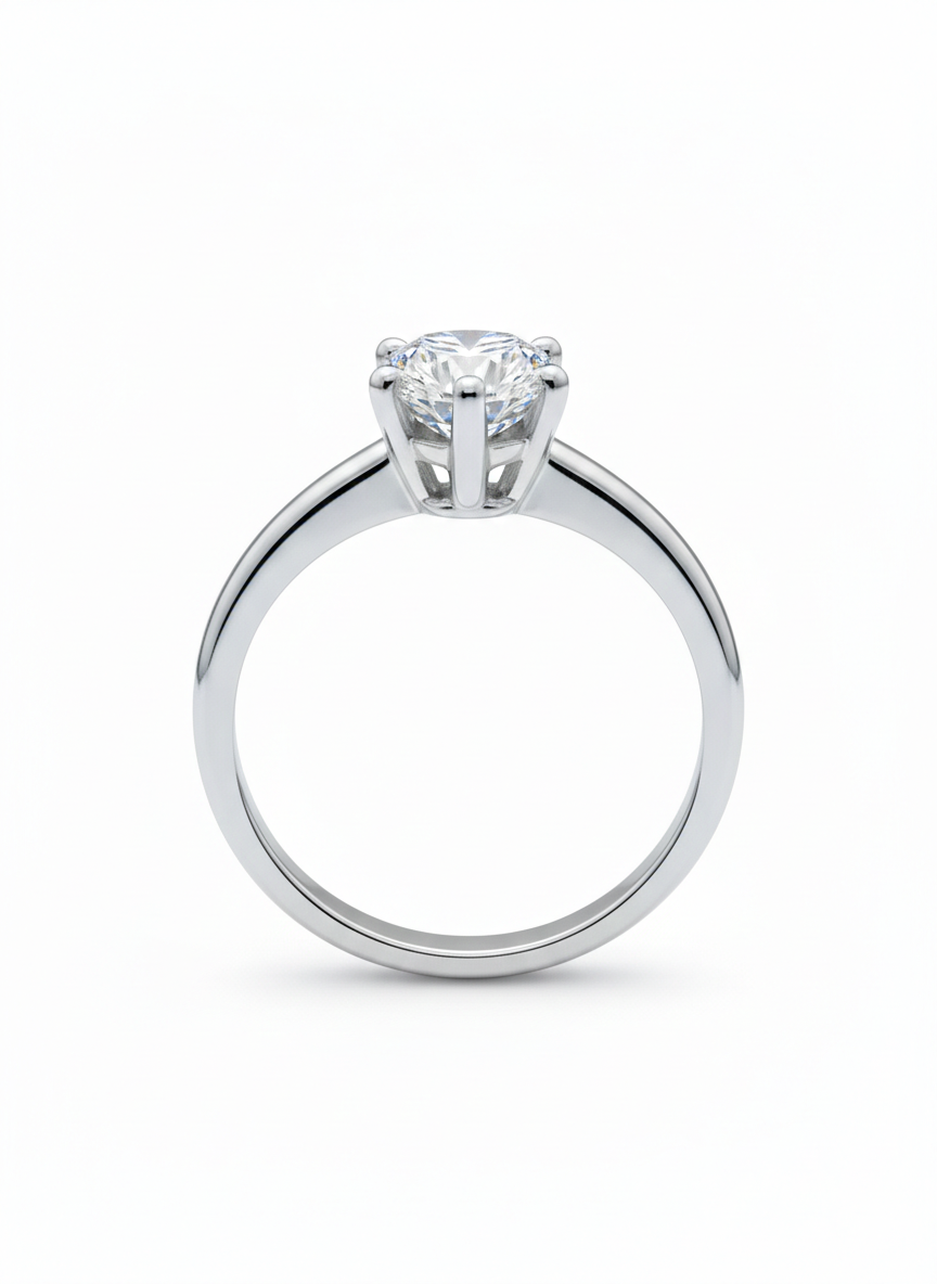 Anillo solitario medio quilate de oro blanco