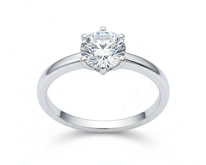 Anillo solitario medio quilate de oro blanco